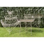 AN EDWARDIAN WHITE PAINTED WIREWORK THREE TIER SEMI ELLIPTIC PLANT STAND (3)