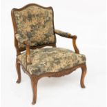 A LOUIS XV STAINED BEECH OPEN ARMCHAIR