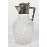 A VICTORIAN SILVER MOUNTED FACETED CUT GLASS CLARET JUG