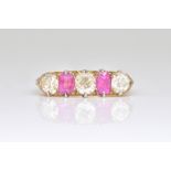 AN 18CT GOLD, RUBY AND DIAMOND FIVE STONE RING
