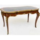 IN THE MANNER OF LOUIS XV; A FRENCH ORMOLU MOUNTED SHAPED RECTANGULAR SINGLE DRAWER BUREAU...