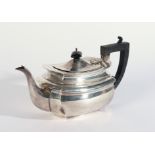 A SILVER TEAPOT