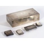 A SILVER CIGARETTE BOX AND FOUR VESTA CASES (5)