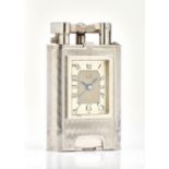 A CHROME PLATED METAL DUNHILL OVERSIZED CLOCK TABLE LIGHTER