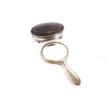 A SILVER AND TORTOISESHELL OVAL MANICURE CASE AND A SILVER MOUNTED HAND MIRROR (2)