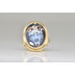 A GOLD AND SARDONYX CAMEO RING