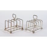 A PAIR OF SILVER FIVE BAR TOASTRACKS (2)