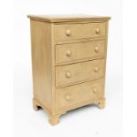 A PISTACHIO PAINTED FOUR DRAWER CHEST