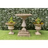 A RECONSTITUTED STONE BIRD BATH ON BALUSTER COLUMN AND STEPPED SQUARE BASE (3)