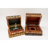 TWO GILT-TOOLED LEATHER COVERED FAUX BOOK TANTALUS CASES