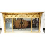 A REGENCY GILT FRAMED TRIPLE PLATE OVERMANTEL MIRROR