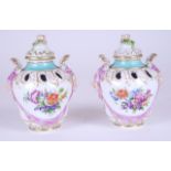 A PAIR OF SMALL BERLIN PORCELAIN POT POURRI VASES AND COVERS (4)