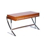 IN THE STYLE OF RENE HERBST; A 20TH CENTURY WALNUT AND CHROME MOUNTED BUREAU OR DESK
