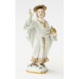 A CONTINENTAL PORCELAIN FIGURE OF A SAINT OR A YOUNG JESUS
