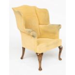 A 20TH CENTURY QUEEN ANNE STYLE WALNUT WING-BACK ARMCHAIR