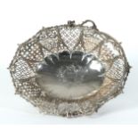 A GEORGE III SILVER CAKE BASKET