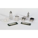 A SILVER THREE PIECE CRUET SET, THREE GLASS CRUETS AND TWO FRUIT KNIVES (8)