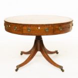 A GEORGE III MAHOGANY DRUM TABLE ON FOUR DOWN-SWEPT SUPPORTS