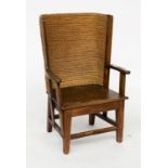 AN EARLY 20TH CENTURY STAINED PINE FRAMED ORKNEY CHAIR