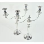 A PAIR OF PLATED ON COPPER TWIN LIGHT TABLE CANDELABRA