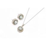 A WHITE GOLD, GREY TINTED CULTURED PEARL AND DIAMOND PENDANT AND A MATCHING PAIR OF EARSTUDS (3)