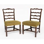 A PAIR OF 18TH CENTURY MAHOGANY WAVEY LADDER BACK SIDE CHAIRS (2)