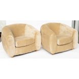 A PAIR OF MODERN TUB BACK EASY ARMCHAIRS ON TURNRD SUPPORTS