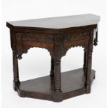 A 17TH CENTURY CARVED OAK CREDENCE TABLE