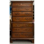 AN INLAID GEORGE II MAHOGANY CHEST-ON-CHEST WITH REEDED CANTED CORNERS