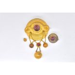 A VICTORIAN GOLD AND CARBUNCLE GARNET BROOCH AND ANOTHER BROOCH (2)