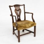 A GEORGE III CARVED MAHOGANY OPEN ARMCHAIR