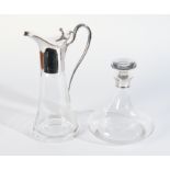 A SILVER MOUNTED CLARET JUG AND A SILVER MOUNTED DECANTER (2)