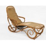 PROBABLY THONET; A MID-20TH CENTURY BEECH BENTWOOD RECLINING CHAISE LOUNGE