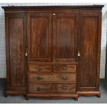 A GEORGE III CROSSBANDED MAHOGANY BREAKFRONT COMPACTUM WARDROBE