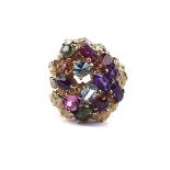 A MULTI-COLOURED GEMSTONE SET 18CT GOLD RING OF ABSTRACT CLUSTER DESIGN