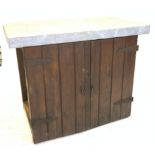 A 20TH CENTURY STAINED PINE TWO DOOR CABINET WITH ZINC COVERED TOP