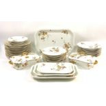 A 20TH CENTURY LIMOGES DINNER SERVICE DECORATED WITH LEAVES