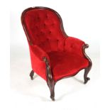 A MID-19TH CENTURY MAHOGANY SPOONBACK EASY ARMCHAIR