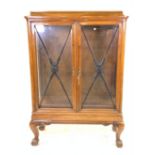 A VICTORIAN STYLE WALNUT DISPLAY CABINET