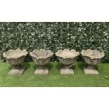 A GROUP OF FOUR MODERN RECONSTITUTED STONE GARDEN URNS (4)