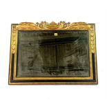 A MODERN GILT FRAMED AND BLACK PAINTED RECTANGULAR WALL MIRROR