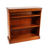 A MODERN YEW WOOD OPEN BOOKCASE