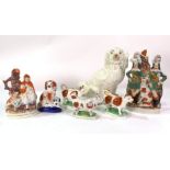 STAFFORDSHIRE CERAMICS; A GROUP OF FIGURES AND DOGS