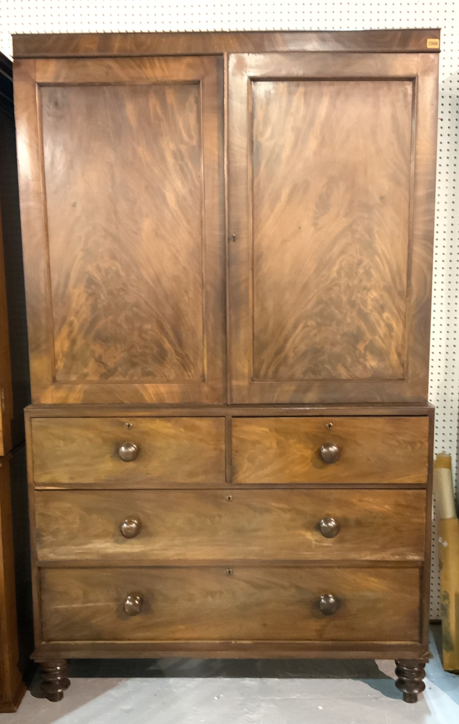 A LATE 19TH CENTURY MAHOGANY LINEN PRESS