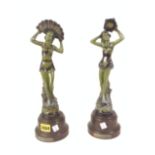 A PAIR OF ART DECO FRENCH SPELTER FIGURES OF LADIES ON BAKELITE BASES
