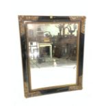 A VICTORIAN STYLE BLACK PAINTED AND GILT DECORATED RECTANGULAR WALL MIRROR