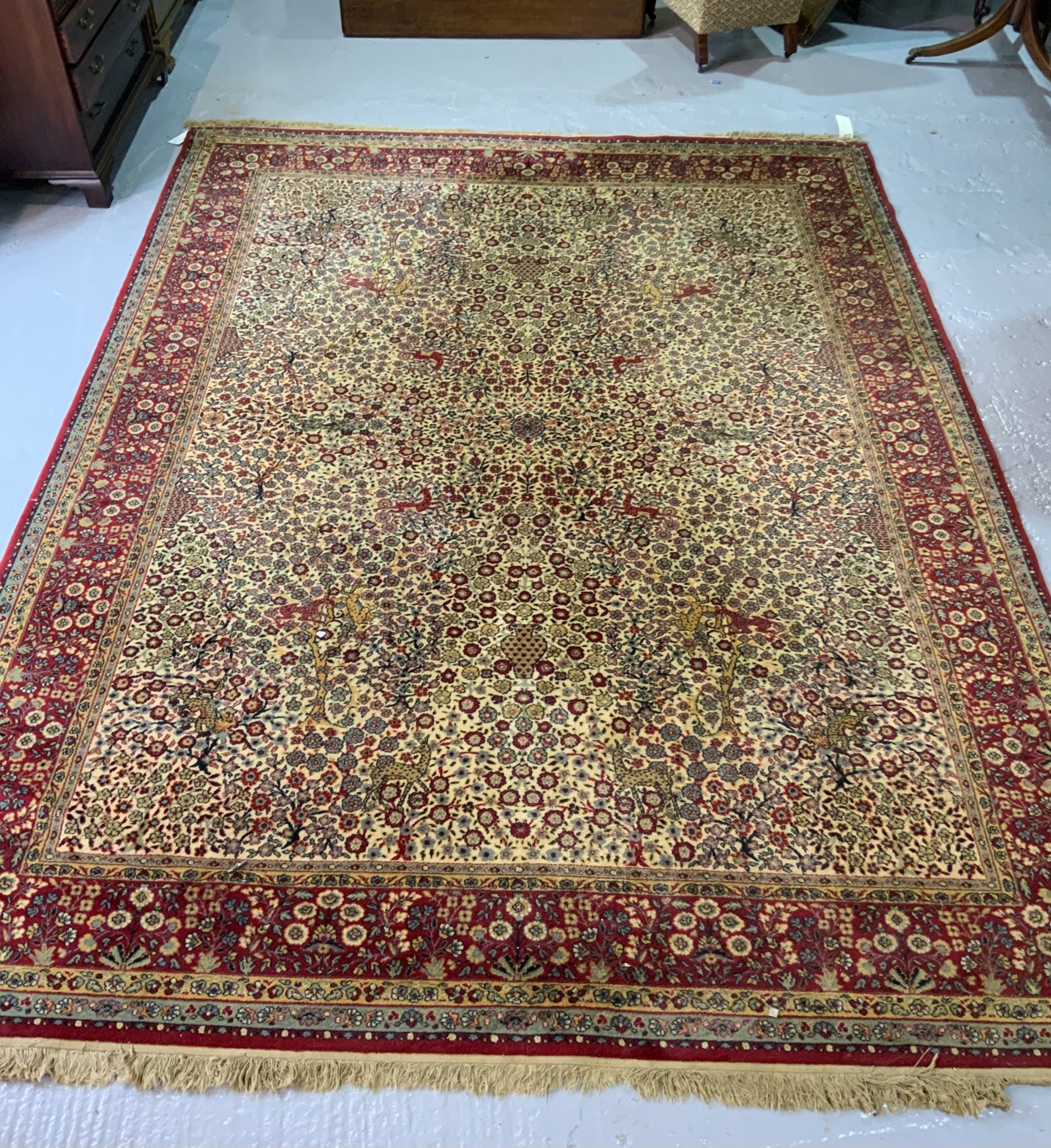 A MACHINE MADE CARPET OF PERSIAN DESIGN