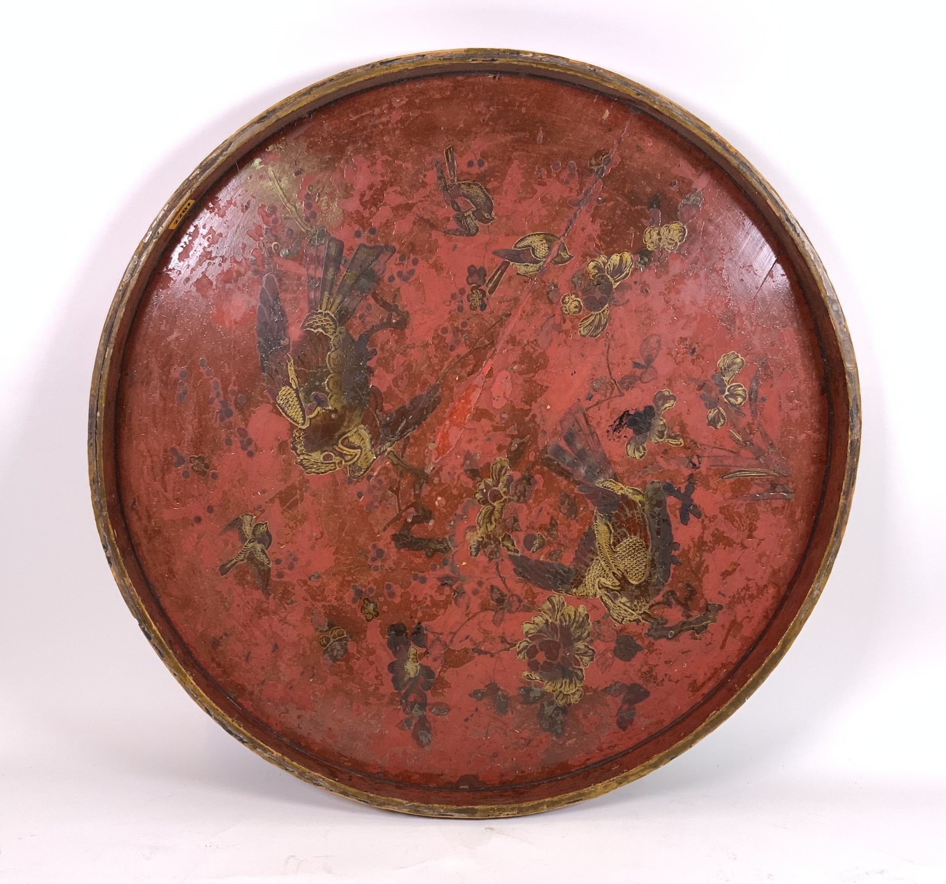 A RED JAPANNED TRAY