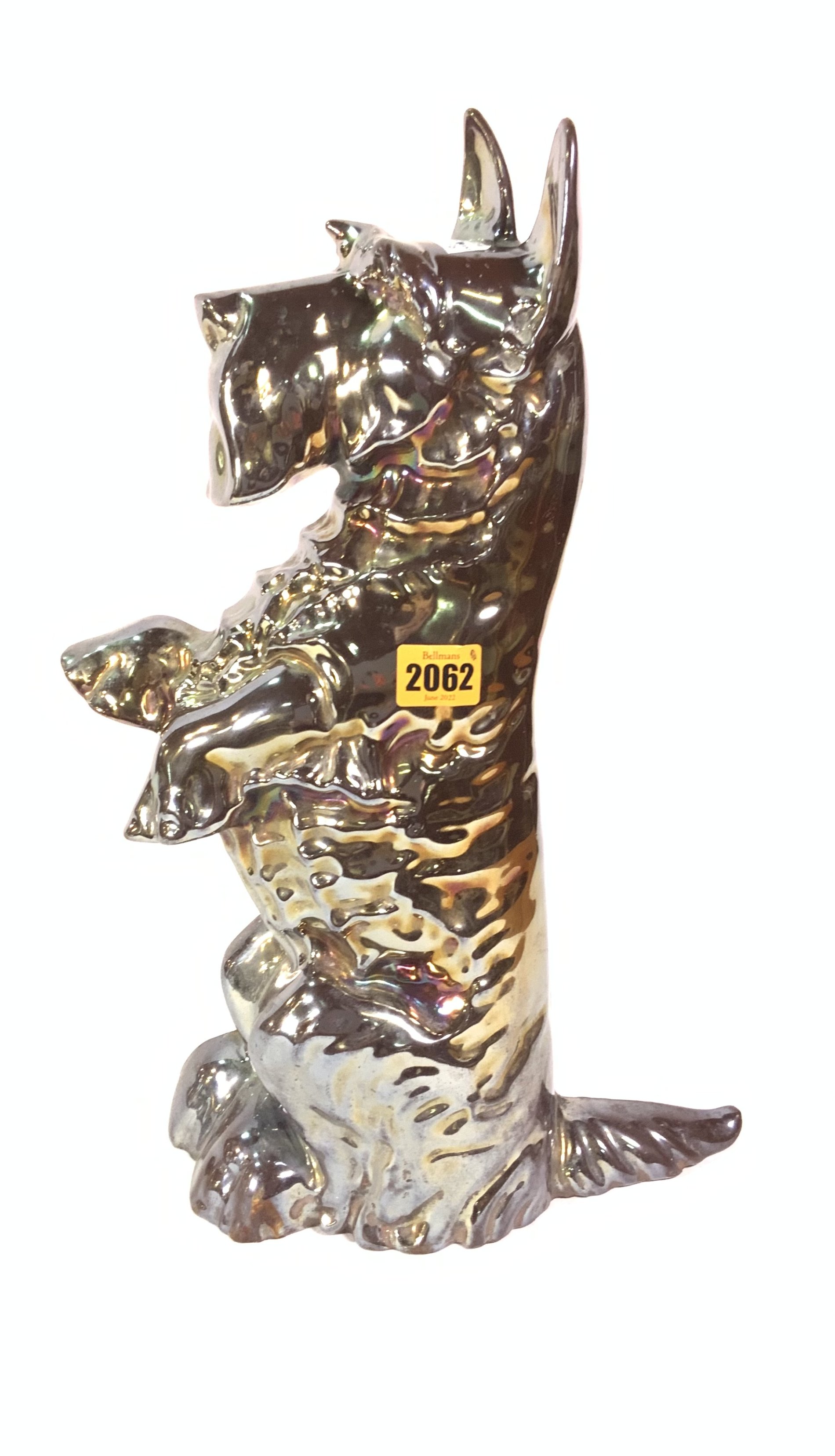 A MID-20TH CENTURY SILVER LUSTRE DOOR STOP FORMED AS A SCOTTY DOG