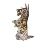 A MID-20TH CENTURY SILVER LUSTRE DOOR STOP FORMED AS A SCOTTY DOG